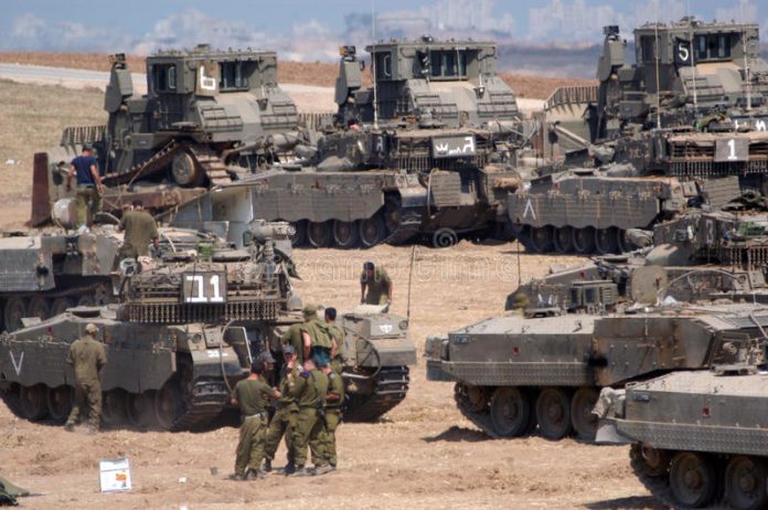 Palestine-Israeli-Military-vehicles-move-into-Center-of-Gaza-696×462