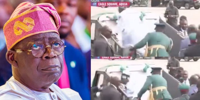 Video-trends-as-President-Tinubu-falls-while-climbing-a-parade-car-for-Democracy-Day-celebration-today-Watch-696×348-1